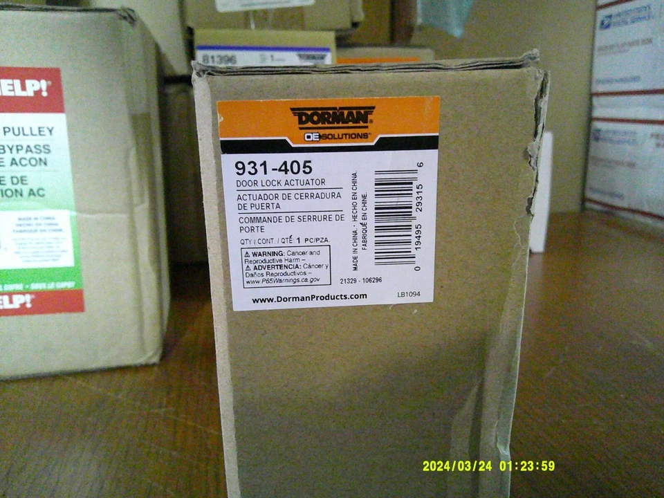 Motor actuador de bloqueo de puerta Dorman 931-405 LR para algunas aplicaciones Lexus, Scion y Toyota. Foto 1 de 1