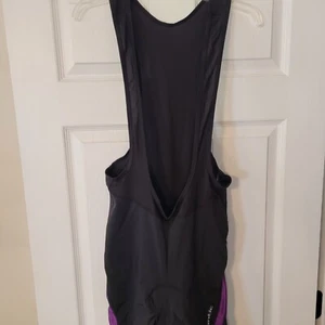 NEU Santic Radsport Trägerhose Neu mit Etikett Größe 2XL Cloud lustig Damen schwarz lila - Bild 1 von 12