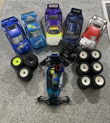RC10GT Blue Chassis With Many Extras - Bodies, Tires, Radio System - Functioning - Image 1 of 4