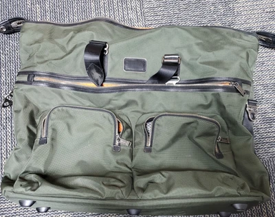 Tumi vtg large flat bag, green with orange and silver interior, lots of pockets - Image 1 of 4