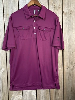 Polo de golf Ashworth magenta L — Camisa técnica de bolsillo utilitario Foto 1 de 4