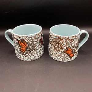 Set of 2 Elama Monarch Butterfly Garden Stoneware Coffee Tea Mugs Blue Floral - Picture 1 of 9