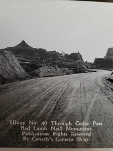 RPPC Highway 40 Cedar Pass Monument Badlands Canedy's Camera Curio Shop B669 - Imagen 1 de 3