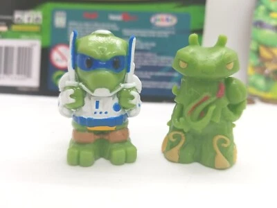 2 Toppers Lápiz Tortugas Ninja OOSHIES TMNT DIMENSIÓN X LEO & SNAKEWEED Foto 1 de 4
