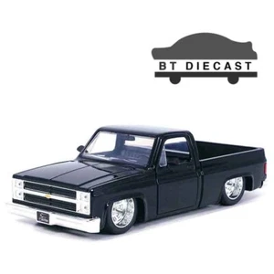 JADA JUST TRUCKS 1985 CHEVROLET C-10 1/24 with MINILITE WHEELS BLACK 35852 - Picture 1 of 2