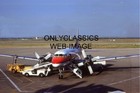 1979 FRONTIER AIRLINES CONVAIR 580 TURBO PROP GETTING FUEL BY AIRPORT CREW PHOTO