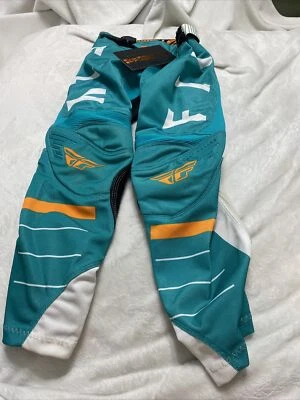Pantalones de malla cinética Fly Racing niños jóvenes | blanco/verde azulado/naranja talla 22 Foto 1 de 4