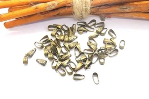 Lot 100 bélières métal bronze pour pendentif - Picture 1 of 1