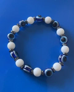 Bracciale elastico Occhio Turco Perline Bianche e Nazar Uomo Donna Portafortuna - Foto 1 di 2
