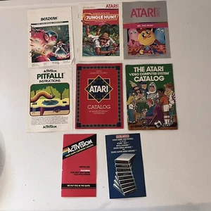 Atari 1600 manuals And Inserts Catalogs Lot Of 8 Berserk Pitfall Jungle Hunt - Picture 1 of 5