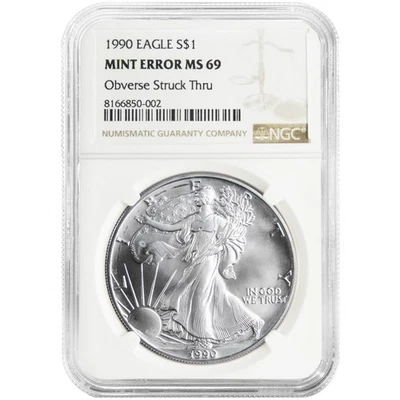 1990 $1 American Silver Eagle NGC MS69 Mint Error Obverse Strike Thru - Image 1 of 2