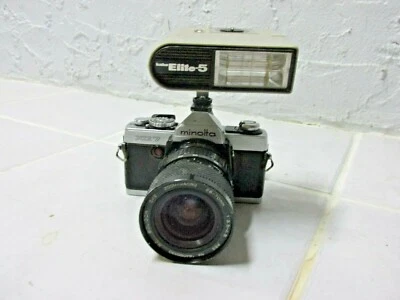 CÁMARA MINOLTA XG7 con LENTE SOLIGOR Y FLASH ELITE 5 PARA DISPLAY Foto 1 de 4