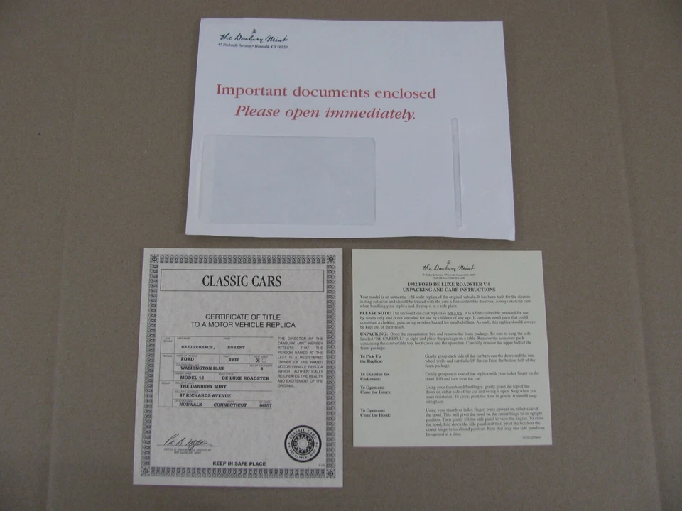 Danbury Mint Diecast Blue 1932 Ford Model 18 Deluxe Roadster Title & Paperwork - Image 1 of 4