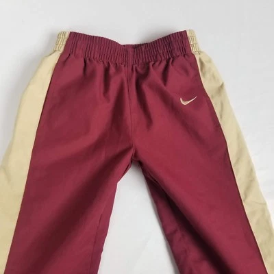 Pantalones Nike Team Boys Talla 4 Rojo Dorado FSU Semínolas Malla Forrados Calentamiento Foto 1 de 4