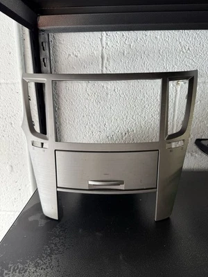 2010-2012 SUBARU LEGACY FRONT CENTER DASH RADIO BEZEL TRIM W/ STORAGE TRAY - Image 1 of 4