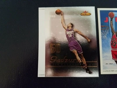 Dan Gadzuric Milwaukee Bucks 2003 - 2004 Fleer Mystique OVERSIZE White Strip - Image 1 of 2