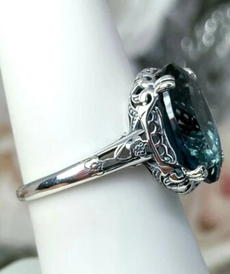Филигранное (заказное) кольцо из чистого серебра с имитацией драгоценного камня London Blue Oval 6 карат D70 - Изображение 1 из 4