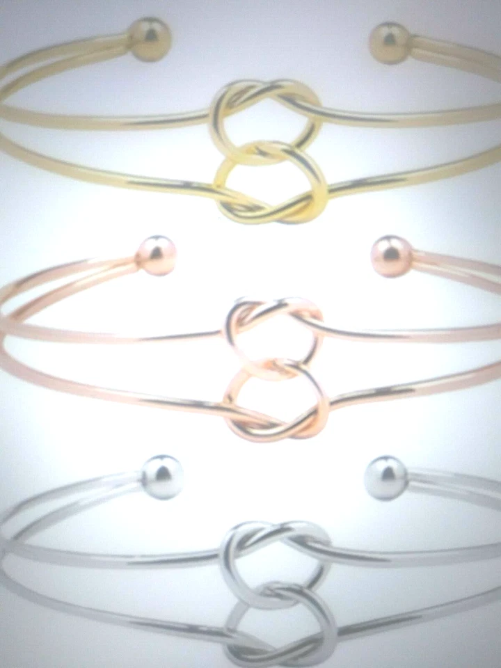 CHOICE OF WOMENS 14K & STS MULTI COLOR STACKABLE LOVE KNOT BANGLE BRACELET ADJ. - Image 1 of 1