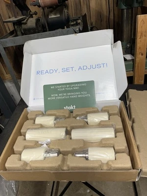 Peso de mano ajustable Stakt Weights Dune que se flexiona para tu entrenamiento Foto 1 de 4