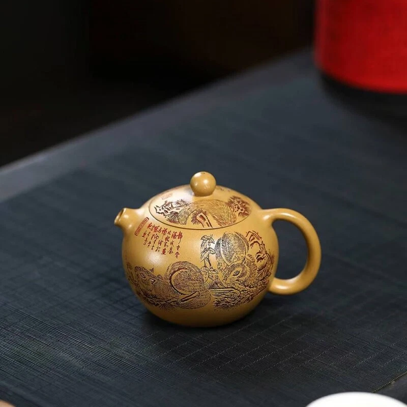 Tetera de arcilla True Yixing Zisha Duan tallada a mano olla Xishi marcada 200 ml olla china Foto 1 de 4