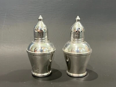 "Juego de saleros y pimenteros vintage con peso de plata esterlina, 3 1/4"" de altura" Foto 1 de 4