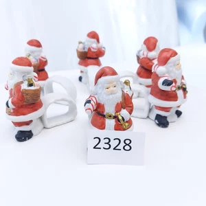 Seis servilleteros de cerámica vintage 1999 - Papá Noel con cuerno y bolsa - Imagen 1 de 13