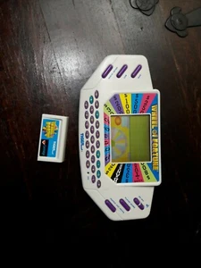 Vintage (1995) Tiger Electronics Wheel of Fortune Handheld Game w/ Cartridge - Picture 1 of 2
