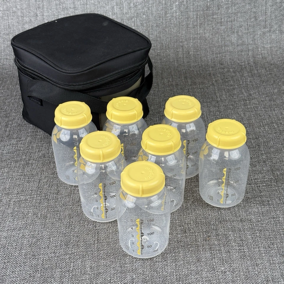 Lote de 7 biberones y tapas de almacenamiento de leche materna Medela de 5 oz/150 ml Foto 1 de 4