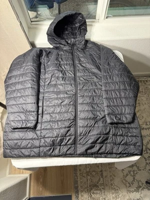 Chaqueta acolchada con capucha resistente al viento negra Feel The Fit Torrid para mujer talla 6 Foto 1 de 4