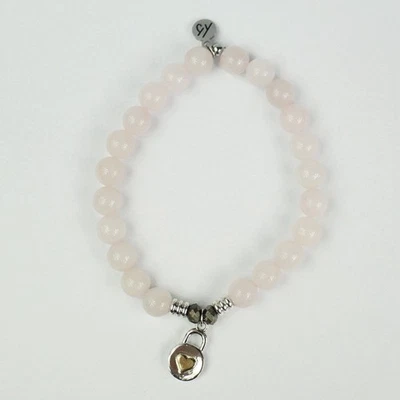 Pulsera elástica de cuarzo rosa con dije en corazón de plata de ley T Jazelle Foto 1 de 4