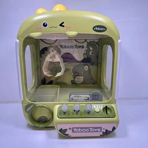 Yaboo Toys Mini Artiglio Macchina Tema Dino Giocattolo per Bambini Si Illumina Divertimento - Foto 1 di 9