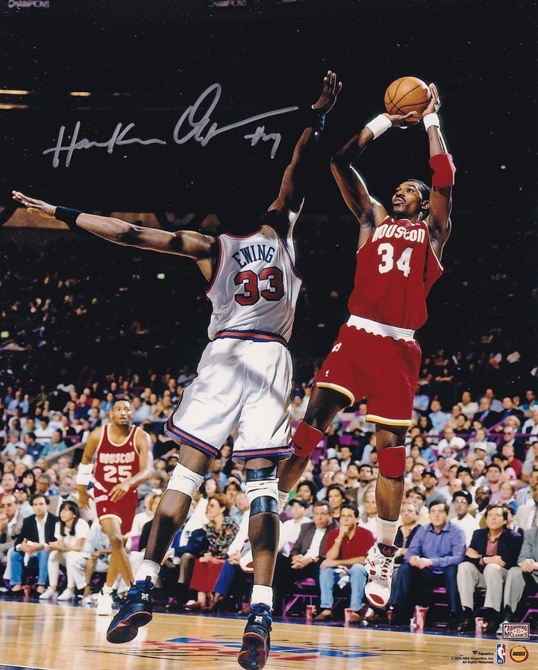 HAKEEM OLAJUWON SIGNED AUTOGRAPH 8 X 10 PHOTO HOUSTON ROCKETS - Image 1 of 1