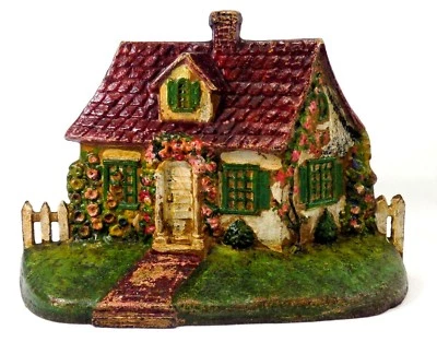 LATE 19TH C ANTIQUE CAST IRON COTTAGE DOORSTOP IN ORIG PAINT, W/FENCING, FLOWERS - Image 1 of 4