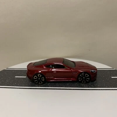 Hot Wheels Faster Than Ever '12 99/247 9/10 Aston Martin DBS Red w/FTE - 1:64 NM - Image 1 of 4