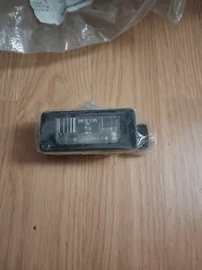 OEM BMW E46-E90-E91-X6-E39 License plate light NEW GENUINE  63268372001. #1585 - Bild 1 von 3