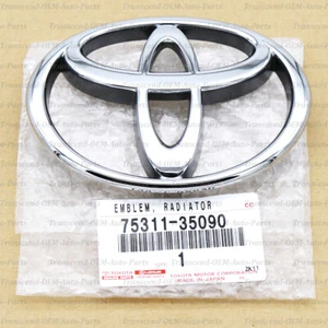 75311-35090 GENUINE OEM FRONT GRILLE BEDGE EMBLEM TACOMA PICKUP 4RUNNER T100 - Picture 1 of 4