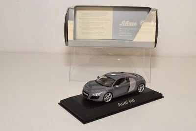 B6 1:43 SCHUCO AUDI R8 GRIS METÁLICO-AZUL JETBLAU CAJA DE DISTRIBUIDOR SIN USAR, EN CAJA Foto 1 de 4