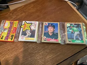 1987 TOPPS RACK PACK MARK MCGUIRE ROOKIE AND KEITH HERNANDEZ ALL STAR SHOWING - Picture 1 of 2