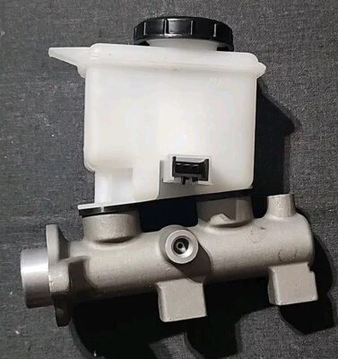 Cilindro maestro de freno con depósito y sensor para Ford Escort Mercury Tracer automático Foto 1 de 4