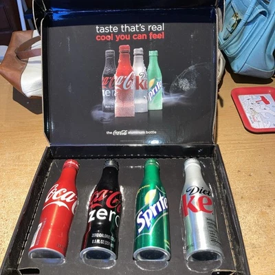 Полный набор коллекционных алюминиевых бутылок Coca Cola никогда не открывался - Изображение 1 из 4