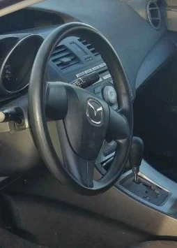 2010-2013 Mazda Mazda 3 LH Driver Steering Wheel Airbag OEM - Image 1 of 2