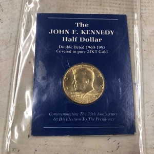 The JOHN F. KENNEDY Half Dollar Double Dated 1960-1985 Covered in Pure 24K Gold - Picture 1 of 2