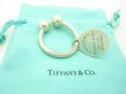 Please Return To Tiffany & Co. Sterling Small Round Dog Tag Key Ring - Pouch - A