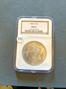 1884-O $1 dollaro Morgan argento non circolato classificato da NGC come MS-64 - Foto 1 di 6