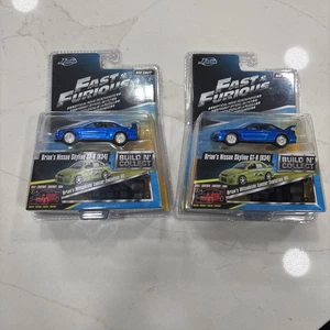 Jada Fast & Furious Serie Brian's Nissan Skyline GT-R (R34) Posten Verkauf 2 Autos Neu - Bild 1 von 4