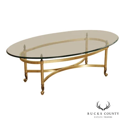 Mesa de centro ovalada con tapa de vidrio Hollywood Regency Foto 1 de 4