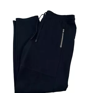 Pantalones elásticos híbridos Athleta Headlands para mujer talla mediana negros bolsillos con cremallera - Imagen 1 de 9