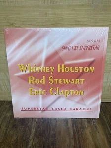Whitney Houston. Rod Stewart. Eric Clapton. Karaoke láser Superstar. - Imagen 1 de 4
