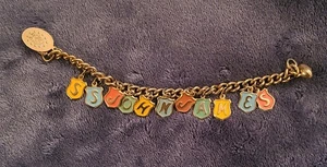 BRACCIALE CHARM anni '60 SS John James - MEDAGLIA tono oro - RARO! - Foto 1 di 9
