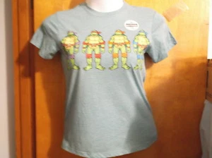 BRAND NEW TEENAGE MUTANT TURTLE LINE GREEN CREW NECK T' SHIRT by "NICKOLDEON" - Picture 1 of 3
